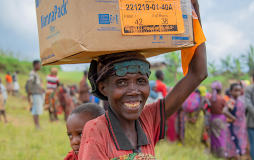 Women carrying rice